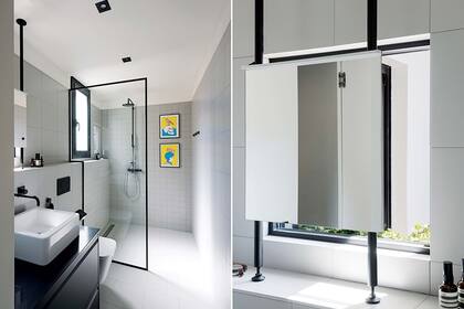 El espejo sobre el vanitory se colocó escindido de la ventana, para no bloquear la fuente de luz natural