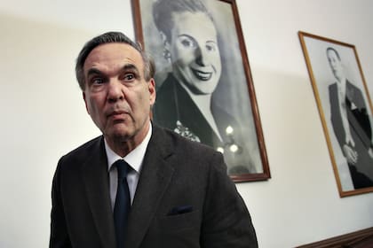 En una imagen de julio de 2017 junto a los retratos de Evita y Perón