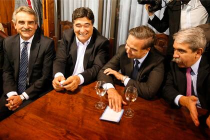Rossi, Zannini, Pichetto y Aníbal Fernández en una reunión del PJ, el 3 de abril de 2014