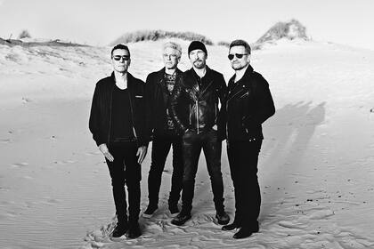 Larry Mullen Jr., Adam Clayton, The Edge y Bono