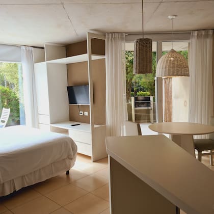 Las casas de playa de Villa Agostina Apart & Spa están equipadas con cocina, espacio exterior y parrilla.