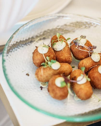 Las croquetas de puchero y jamón de bellota que se sirvieron durante la inauguración.