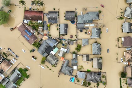 Las inundaciones cubren la mayor parte de Pájaro Valley, California, el domingo 12 de marzo de 2023. Una tormenta fluvial atmosférica rompió un dique a lo largo del río Pájaro inundando casas y negocios y dejando a miles de personas sin refugio