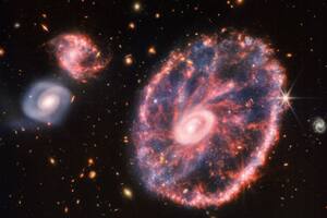 La NASA reveló una fascinante imagen del caos reinante en la galaxia Rueda de Carro