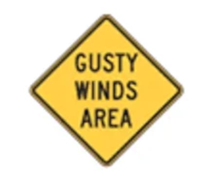 Las señales de zona de fuertes vientos alertan a los conductores sobre ráfagas capaces de desplazar vehículos