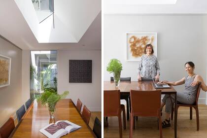 Las titulares de Estudio Planta en el flamante comedor, donde bajaron la altura del techo y rediseñaron una vieja lucarna con disposición horizontal y líneas finas y elegantes.