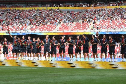 Lavezzi en el podio dorado de Pekín 2008