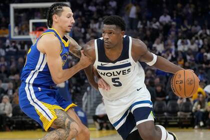 Lindy Waters III intenta limitar el avance de Anthony Edwards; Golden State Warriors visitará a Minnesota Timberwolves en la NBA.