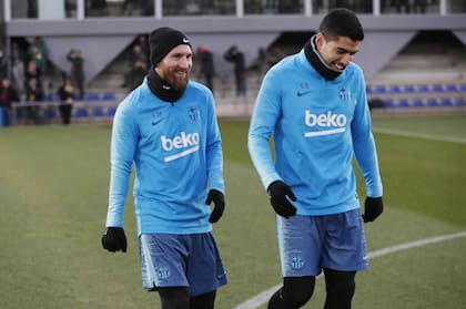 Lionel Messi y Luis Suárez en el entrenamiento de Barcelona