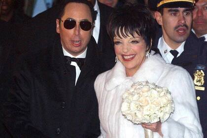Liza y David tuvieron de padrinos a Elizabeth Taylor y Michael Jackson en 2002