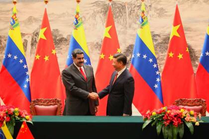 Un encuentro entre los presidentes Nicolás Maduro y Xi Jinping.