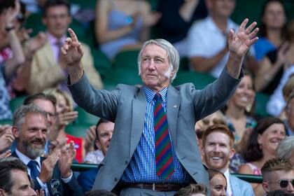 LONDON, ENGLAND - July 7: J. P. R. Williams of Wales is introduced to the crowd on Centre Court during the Wimbledon Lawn Tennis Championships at the All England Lawn Tennis and Croquet Club at Wimbledon on July 7, 2018 in London, England. (Photo by Tim Clayton/Corbis via Getty Images)