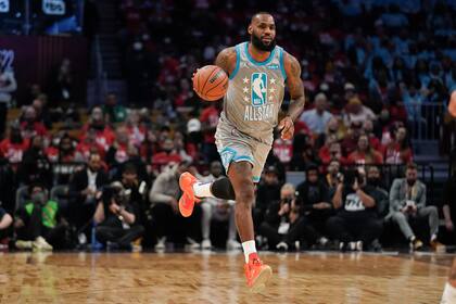 Los Angeles Lakers' LeBron James drives down the court during the second half of the NBA All-Star basketball game, Sunday, Feb. 20, 2022, in Cleveland. (AP Photo/Charles Krupa)