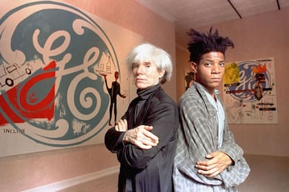 Los artistas pop Andy Warhol, izquierda, y Jean-Michel Basquiat