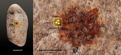 Los científicos aseguran que el punto rojo se colocó para darle forma a lo que parecía un rostro humano tallado en la roca