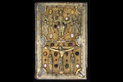 Los clavos doblados que sujetan la encuadernación con joyas de los Evangelios de Judith de Flandes del siglo XI han dejado huellas en las hojas idénticas a las de la hoja trasera del salterio de la Biblioteca Parker