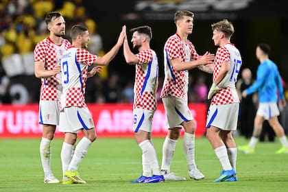 Los croatas celebraron conformes el triunfo ante Colombia, al que le revirtieron el resultado en el primer tiempo y luego le impidieron la igualdad.