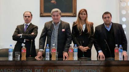 Los cuatro integrantes del Comité de Regularización