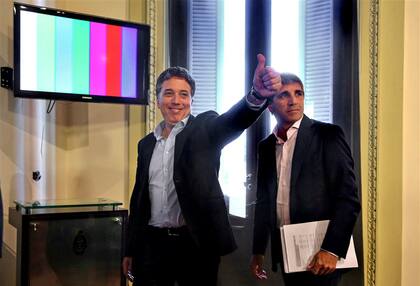 Los designados ministros Dujovne y Caputo, ayer en la conferencia