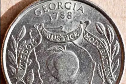 Los errores de las monedas de 25 centavos de Georgia pueden ser varios (Archivo)
