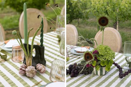 Los espárragos, ajos y uvas le dieron un toque colorido y original a la mesa. Los objetos de cerámica de Huella Atelier, acompañados por velas artesanales en tonos verdes (Nadis Tierra y Cuerpo), se integran con las curvas naturales de las frutas y verduras, creando una armonía orgánica que parece brotar del paisaje.