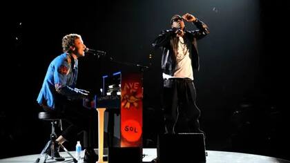 Los fans y colaboradores de Coldplay incluyen a Jay-Z (en la foto en el escenario con Chris Martin), Stormzy y Nick Cave