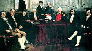 La Primera Junta de Gobierno fue presidida por Cornelio Saavedra y tuvo como secretarios a Mariano Moreno y Juan José Paso y de vocales a Manuel Alberti, Manuel Belgrano, Juan Larrea Miguel de Azcuénaga, Domingo Matéu y Juan José Castelli. 