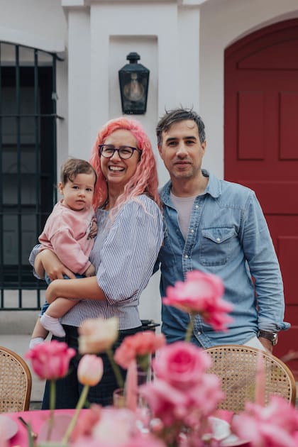 Lucila y Daniel con su hija Margarita.