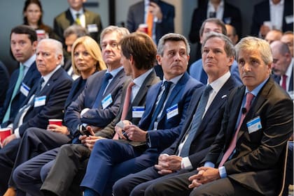 Luis Caputo, Alec Oxenford y José Luis Daza, en la Argentina Week.