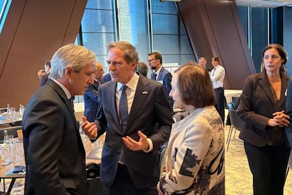 Luis Caputo, Alec Oxenford y Susan Segal, en el "Argentina Week".