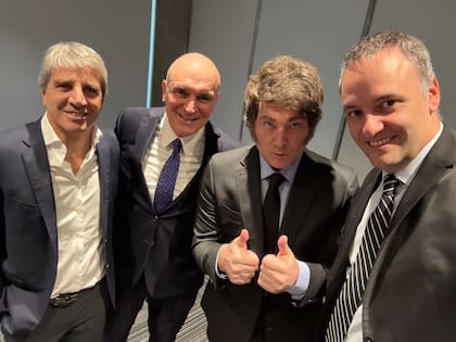Luis Caputo, José Luis Espert, Javier Milei y Manuel Adorni