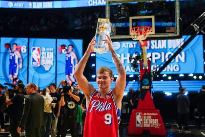 Mac McClung of the Philadelphia 76ers reacts after winning the slam dunk competition of the NBA basketball All-Star weekend Saturday, Feb. 18, 2023, in Salt Lake City. (AP Photo/Rick Bowmer)