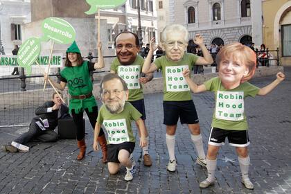 Manifestantes ridiculizaron a los cuatro líderes horas antes del encuentro en Roma