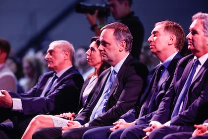 Manuel Adorni, Diego Santilli y Pablo Quirno, en el encuentro de AmCham