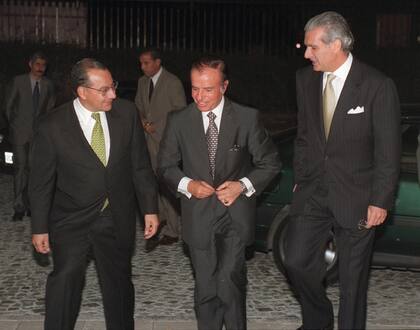 Manuel Rocha, Carlos Menem y el banquero Carlos Fedrigotti, en 1998