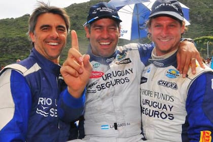 Marcos Ligato saludado por sus compañeros Piojo López y Nalbandian