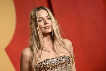 Margot Robbie quisiera haber evitado la escena donde tiene sexo con Leo DiCaprio sobre montañas de dinero en El Lobo de Wall Street