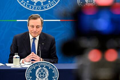 Mario Draghi speaks during a press conference in Rome Thursday, April 8, 2021. Italian Prime Minister Mario Draghi used strong words against Turkish President Recep Tayyip Erdogan and decried the treatment Ursula von der Leyen got in Ankara as “inappropriate.” (Riccardo Antimiani/Pool Photo via AP)