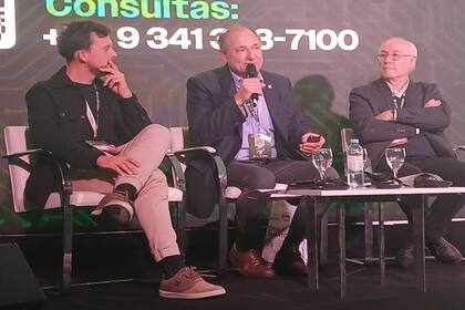Martín Rainaudo, Pablo Mercuri y Roberto Bisang, en el congreso de Aapresid