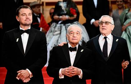 Martin Scorsese, con Leonardo Dicaprio y Robert De Niro, en el Festival de Cannes, 20 May, 2023. (Photo by LOIC VENANCE / AFP)