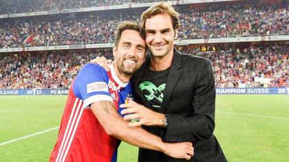 Matías Delgado y Roger Federer