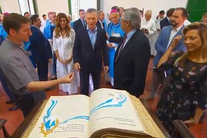 Mauricio Macri y Alberto Fernández, en Luján