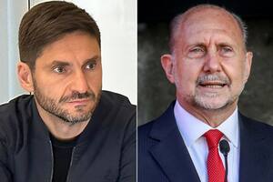 Maximiliano Pullaro, candidato a gobernador por Juntos por el Cambio, y Omar Perotti, gobernador de Santa Fe