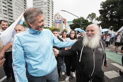 Máximo Kirchner, en la marcha del 24 de marzo junto a su aliado Emilio Pérsico