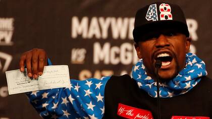 Mayweather y su cheque de 100 millones de dólares