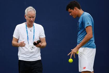 McEnroe con su entrenado Raonic