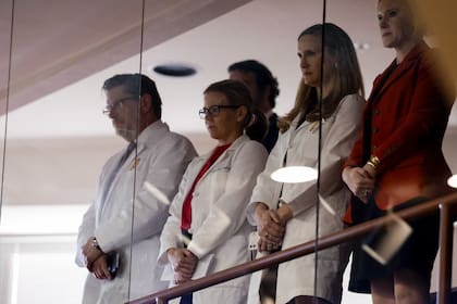 Doctors from the Alabama Fertility Clinic watch as debate over SB159 bill (IVF Fertility Bill) in the House Chambers, Wednesday, March 6, 2024, in Montgomery, Ala. (AP Photo/ Butch Dill)�