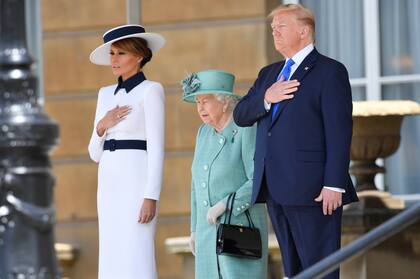Melania, la reina y Donald Trump