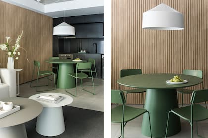 Mesa con pie de chapa y tapa de roble y sillas ‘de madera y hierro lustradas en verde (Cúmulo). Lámpara de techo (Iluminación Agüero). Como muchos viajeros hacen teletrabajo, es importante contar con un espacio adaptable como escritorio –en este caso, la mesa–, enchufes y buen servicio de WiFi.