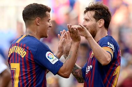 Messi celebra un gol suyo con Coutinho, cuando compartieron el plantel de Barcelona